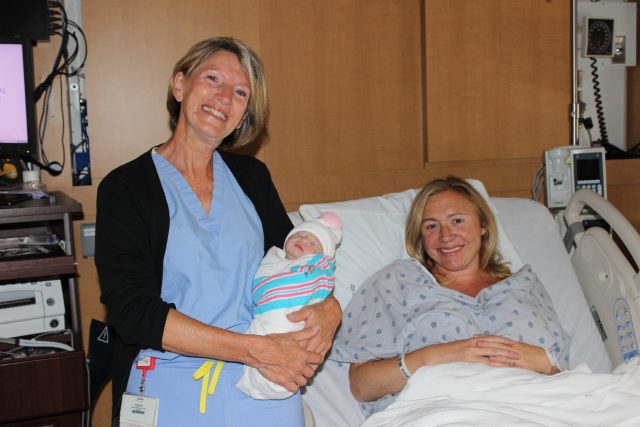 1.4 Christine Smith with baby Amelia and mom Amanda Pitcock of Goshen
