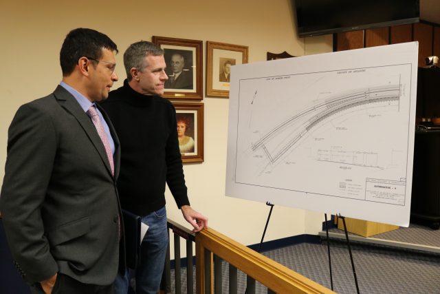 1.4 Jorge Patino from the design firm JMT out of Trenton with Tom Heist look over plans