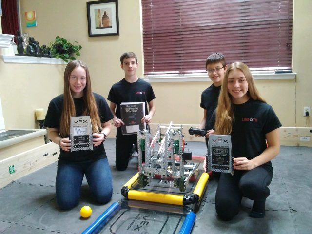 1.4 Linbots show their awards and their robot