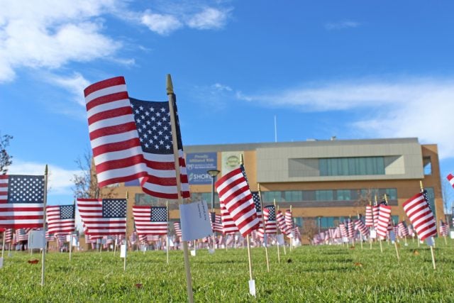 1.4 shore veterans day ceremony flags
