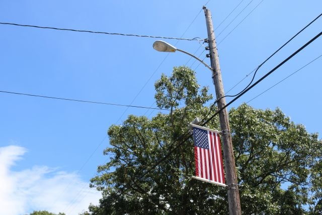 1.4 street lamps broadway flag