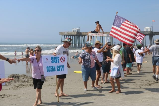1.4 Wind Farm Protest Linking Hands