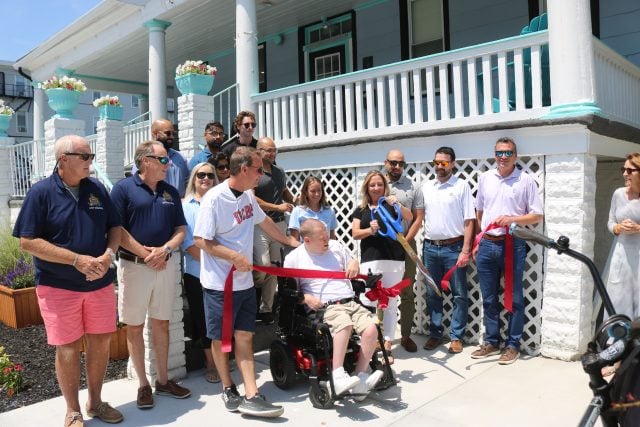 Ribbon Cutting The Cove